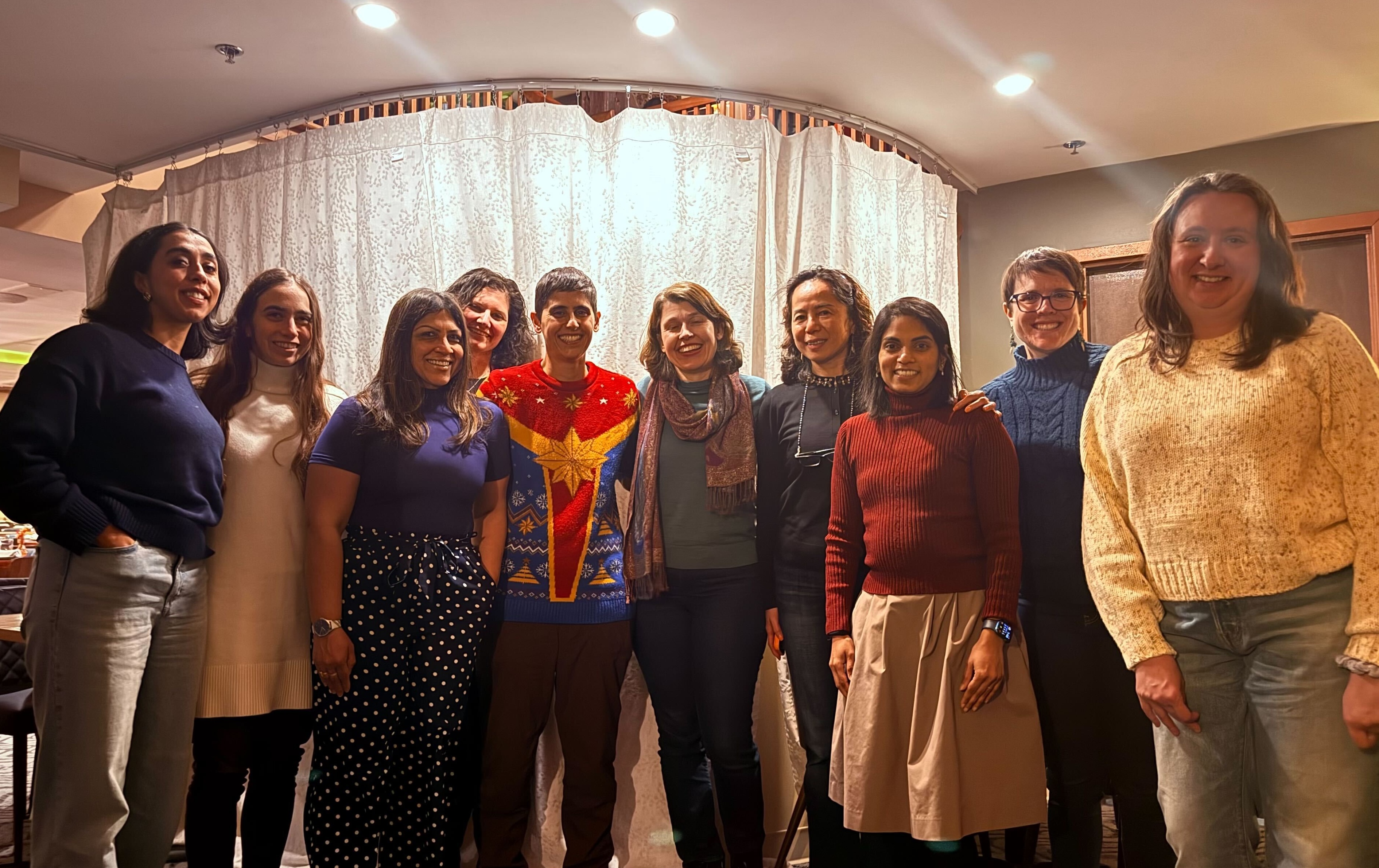Group photo of the Boston Women in Bioinformatics executive board holiday dinner